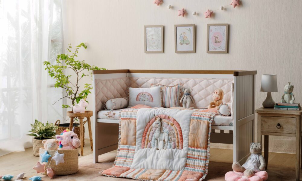MiRooh Cosmic Candy Collection with pastel unicorn-themed bedding and embroidered cushions for children's bedrooms.