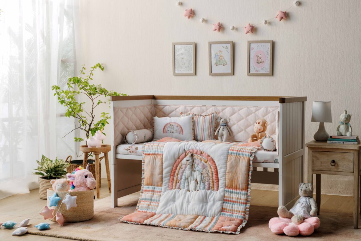 MiRooh Cosmic Candy Collection with pastel unicorn-themed bedding and embroidered cushions for children's bedrooms.